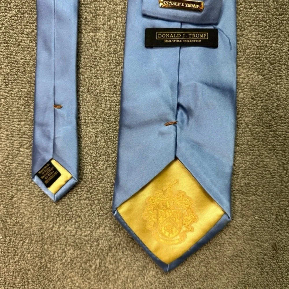 Donald J Trump Signature Collection Silk Tie Solid Light Blue Gold Crest Logo